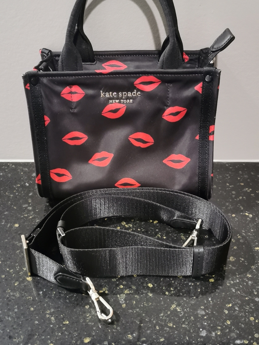 kate spade black mini crossbody bag with red lips pattern